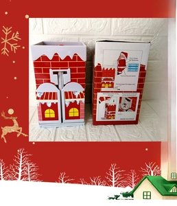 Detailed instructions for electric climbing Santa Claus toy showing battery installation