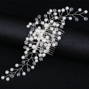 Elegant bridal hair comb with handmade pearls and sparkling crystals on silver wire