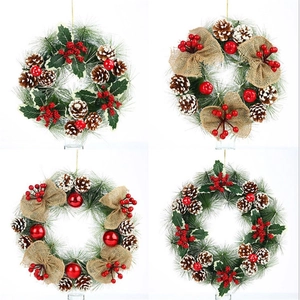 Christmas wreath set with pine cones, red berries and needles for holiday door decoration