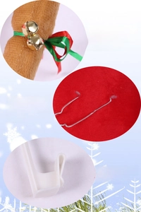 Detailed view of plush reindeer antlers with golden bells and red nose for car decoration