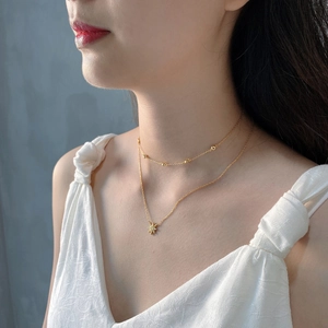Double-layered 925 silver gold galaxy choker with star pendant on female model