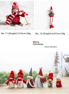Detail of wool felt Christmas gnome ornaments with red and white knitted ski hats