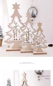 Three-piece wooden Christmas tree set with deer and forest silhouettes for tabletop decor