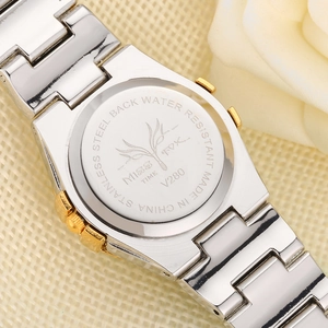 Close-up of stainless steel watch back with water resistant engraving and two-tone band