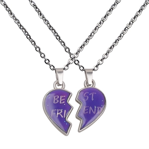 Detail of split heart Best Friend necklaces with glitter purple and blue gradient resin
