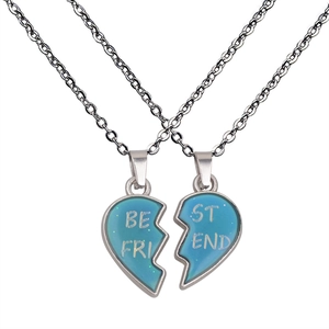 Matching silver heart necklaces with blue glitter for best friends, two halves set