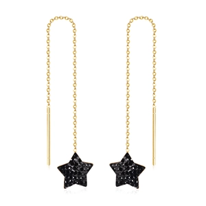 Chic gold chain tassel earrings featuring black star charms in a sleek minimalist style