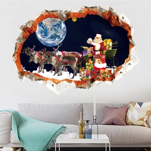 3D Christmas wall sticker with Santa and reindeer flying through a space wall hole