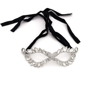 Close-up of sparkling rhinestone bridal mask with elegant marquise-cut crystals and ties