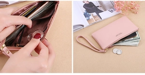 Detail view of pink long wallet with multiple card slots and phone compartment