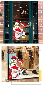 Christmas window stickers featuring Santa, snowman and reindeer on glass door display