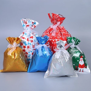 Weihnachtsgeschentüten mit Kordelzug, bunte Geschenkverpackung für Süßigkeiten und Partyartikel.