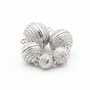Detail of silver magnetic jewelry clasps with micro-paved cubic zirconia and side loops