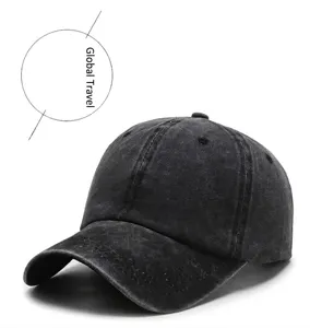 Macro detail of a vintage washed black baseball cap with distressed cotton texture