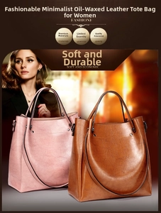 Close-up of vintage oiled leather totes in soft pink and caramel brown with metal D-rings