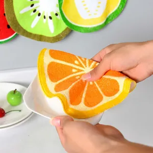 Hanging absorbent fruit-patterned hand towels with orange and kiwi designs
