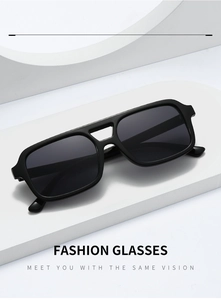 Detail of classic black square sunglasses showing the double bridge and frame texture