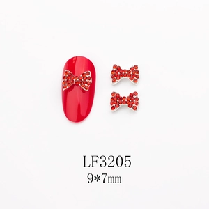 Détail des breloques nœuds rouges en strass 9x7mm LF3205 pour décoration d'ongles