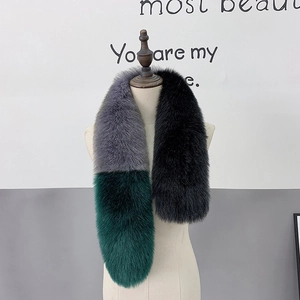 Detail of multi-color faux fur collar with gray, green and black plush textures