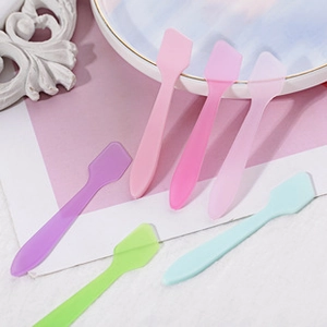Close-up of colorful silicone cosmetic spatulas for facial masks and skincare cream tools
