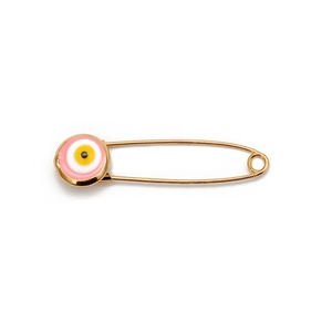 Detailed view of a gold safety pin brooch with a colorful enamel evil eye charm