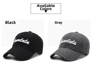 Detail view of black and grey baseball caps featuring premium 3D Juanlala embroidery