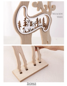 Detail of wooden reindeer ornament showing hollow carved forest design and detachable base