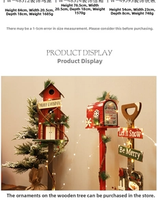 Detailed view of Christmas wooden birdhouse and mailbox ornaments with pine and LED lights