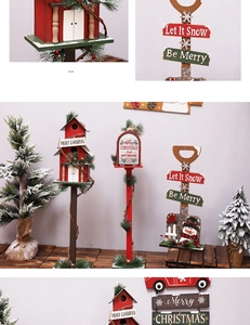 Detailed view of wooden Christmas birdhouses and signs with festive inscriptions