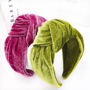 Velvet knotted headband in magenta and moss green with elegant silk texture