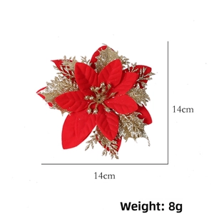 Macro detail of 14cm red velvet and gold glitter hollow artificial Christmas flower