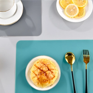 Morandi colors silicone placemats in grey and teal with elegant nordic table setting