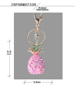 Detailed view of pink crystal pineapple keychain showing dimensions 5.0cm by 3.0cm