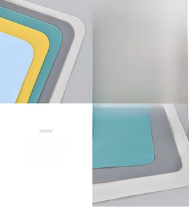 Close-up detail of Morandi silicone placemats with leather-like texture and anti-scald design