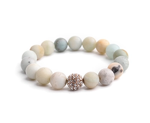 Detailed view of natural stone beaded bracelet with rose gold pavé crystal spacer bead