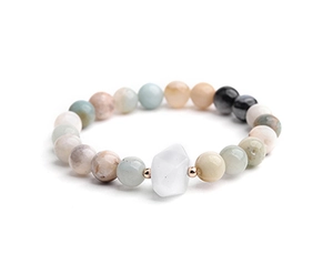 Detail of natural stone beaded bracelet with irregular raw moonstone and rose gold spacers