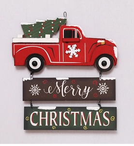 Detail of three-tier wooden Christmas wall sign with red truck and festive Merry Christmas text