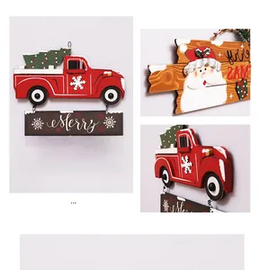 Detail of wooden Merry Christmas hanging signs with red truck and Santa Claus decor
