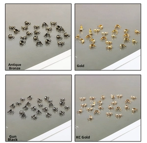 Detalle de conectores de metal plegables para DIY en bronce, oro, negro mate y KC oro