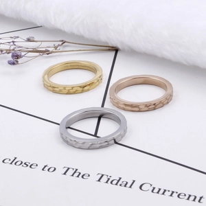 Minimalist hammered texture pinky rings in gold, rose gold, and silver stainless steel