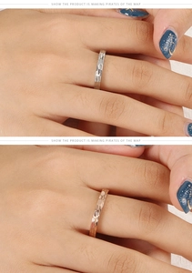 Detail view of silver and rose gold rings featuring unique hand-hammered textures