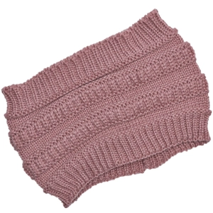 Close-up of rose pink chunky cable-knit headband showing thick textured wool pattern