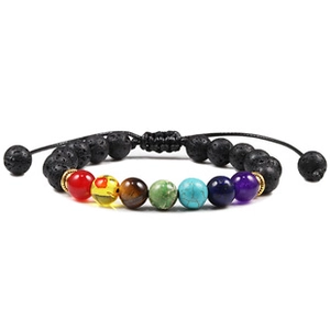 Detailed macro view of Seven Chakra lava stone bracelet with adjustable braided rope