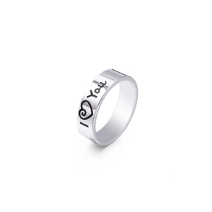 Polished stainless steel ring with I Love You engraving and heart pattern on white background