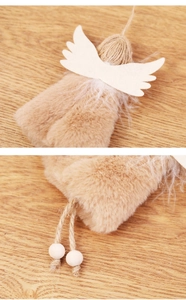 Detail of brown plush Christmas angel pendant with wooden beads and rope legs
