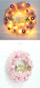 Pink Christmas wreath with purple ornaments and LED lights shown in ON and OFF modes