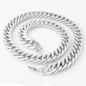 Detailed macro shot of classic silver Cuban link chain showing robust link texture
