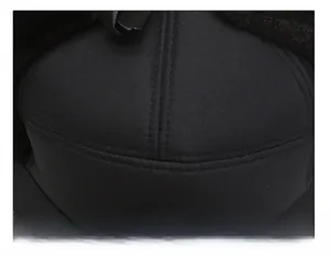 Macro view showing the durable suture technique and stitching on top of the black winter cap