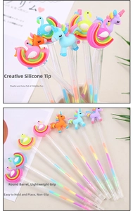 Detail of creative silicone pen heads featuring unicorn and swan shapes with gradient ink
