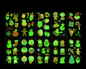 Luminous Christmas tattoo stickers for kids featuring glowing Santa Claus and reindeer designs